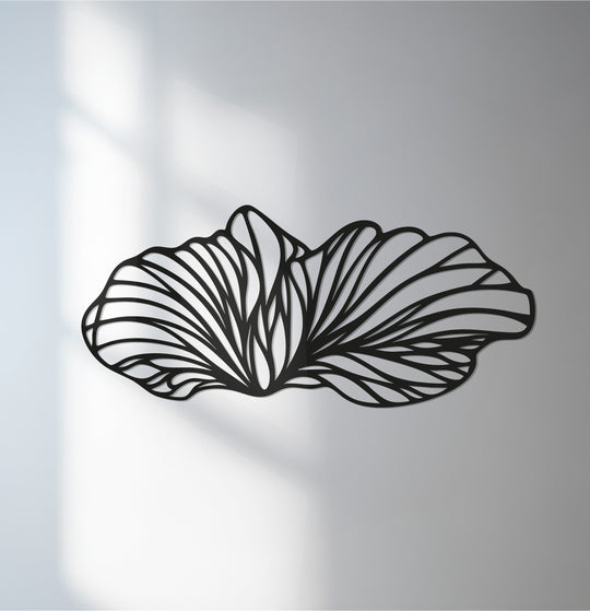 The focal point shows flowing petal metal art for wall, a modern, abstract floral design enhancing home and office spaces.