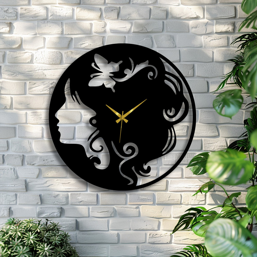 The elegant mood of this black woman silhouette metal wall decor clock with a butterfly radiates sophistication on a white brick wall.