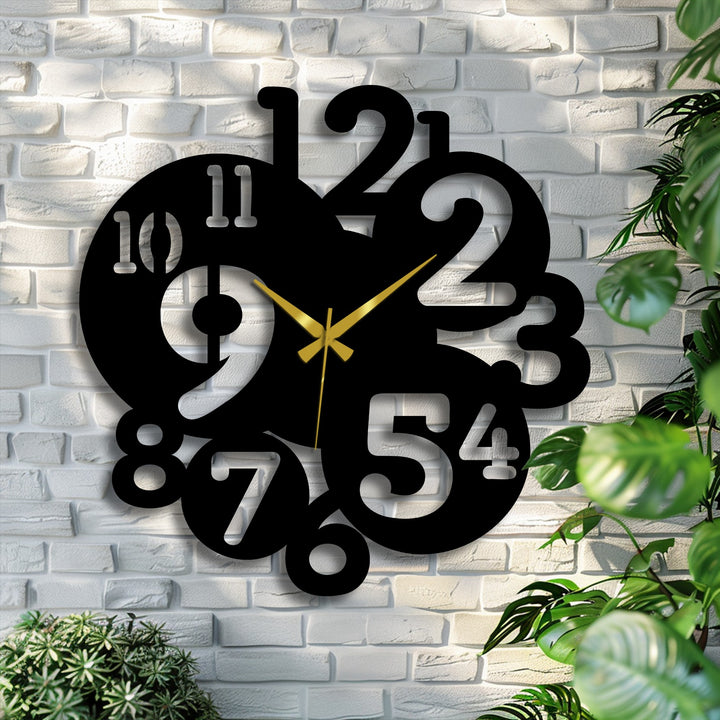 Aesthetic and modern, this overlapping numbers metal artwork wall clock creates a welcoming and time-telling home decoration focal point.