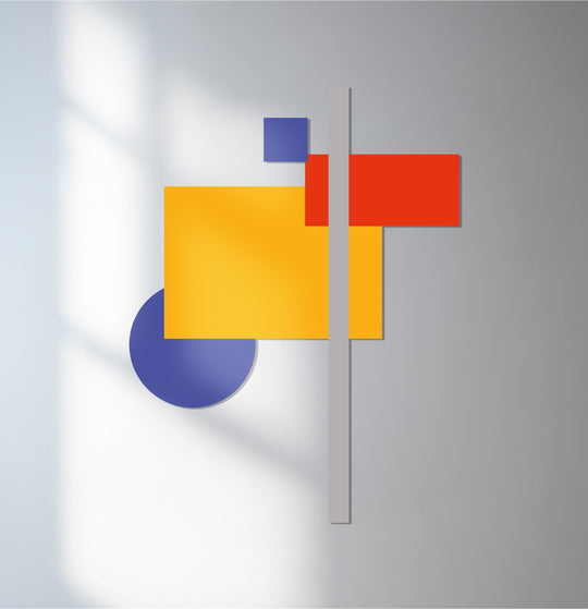 Light and shadow interplay across the abstract geometric metal wall decor, enhancing the color block design with dynamic contrasts and a sense of depth.