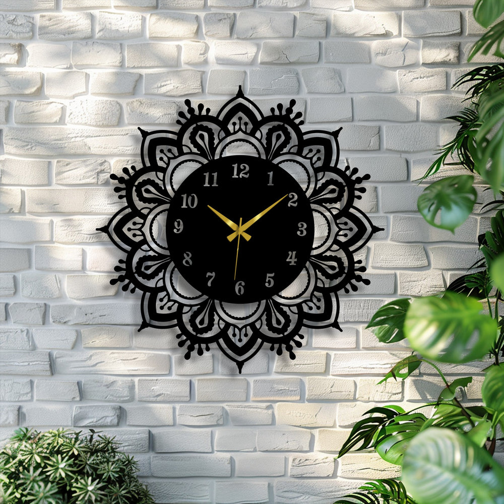 Intricate edges and borders define the metal artwork of this ornate mandala wall clock, creating an elegant and classic wall accent.