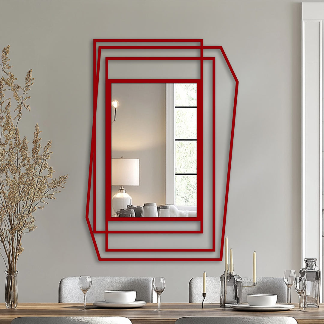 The stillness of the reflected room contrasts with the bold lines of the layered geometric asymmetrical frame, a piece of metal wall decor bringing artful design to any space.