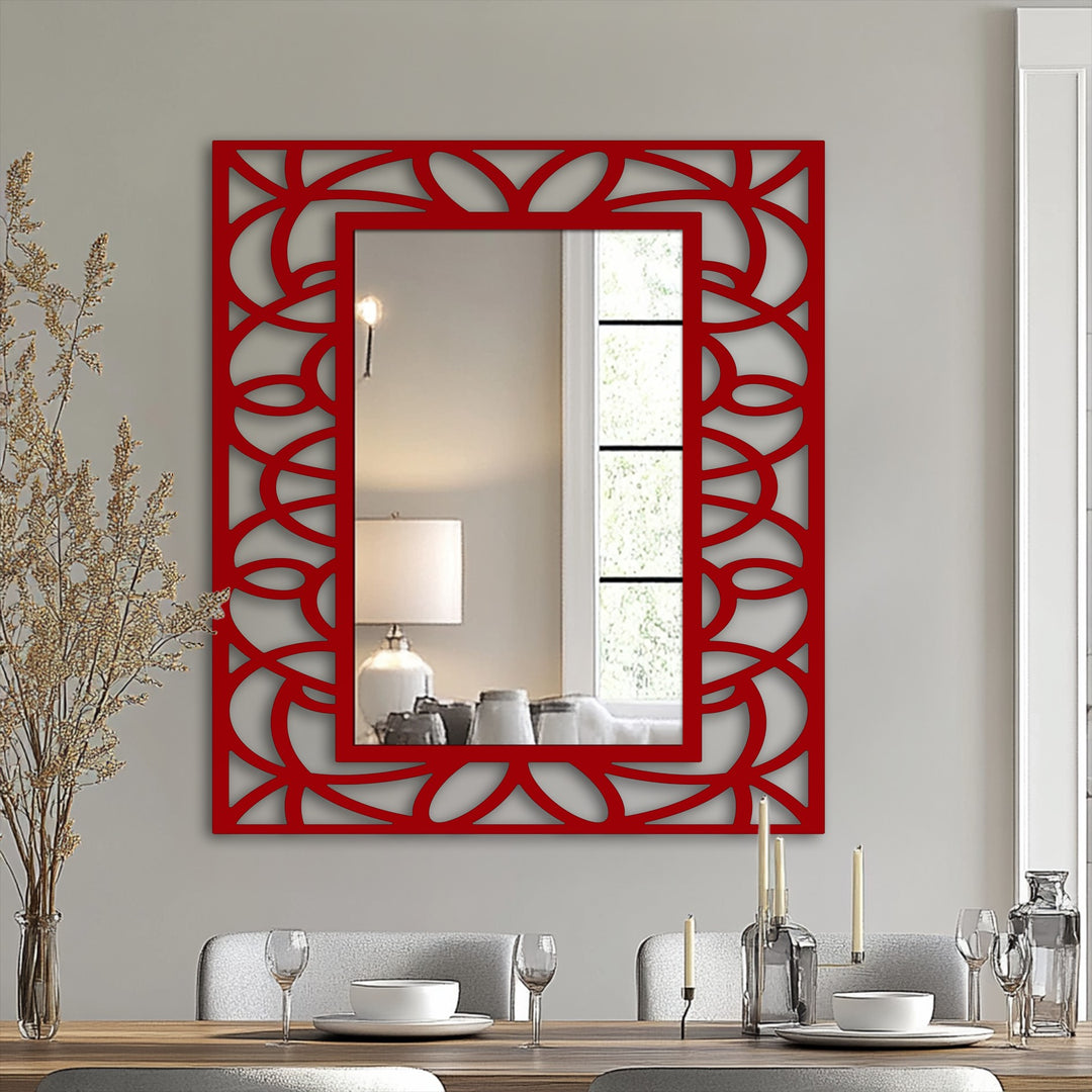 The symmetrical, interwoven floral geometry of this metal art for wall mirror frame creates an energetic sense of swirling motion.
