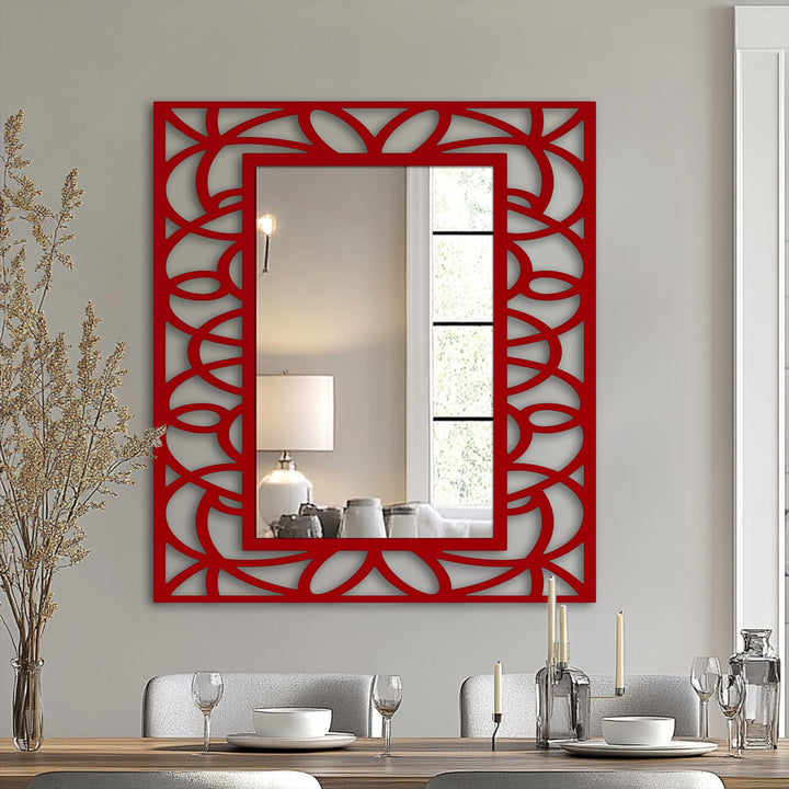 The symmetrical, interwoven floral geometry of this metal art for wall mirror frame creates an energetic sense of swirling motion.