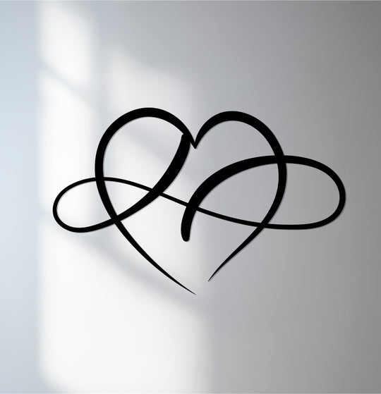 Horizontal decorative metal art featuring an infinity heart shape illustrates a love knot design, casting a subtle shadow.