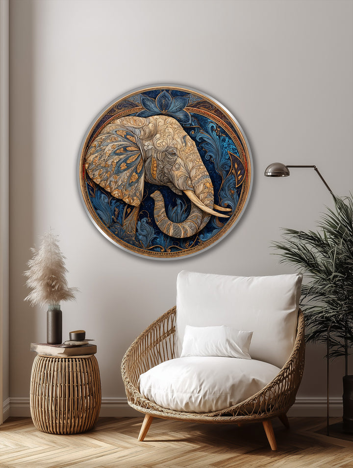 The plush white cushion in the wicker chair offers the softest contrast to the intricate details of the royal lotus guardian ornate elephant round oil painting reproduction print.