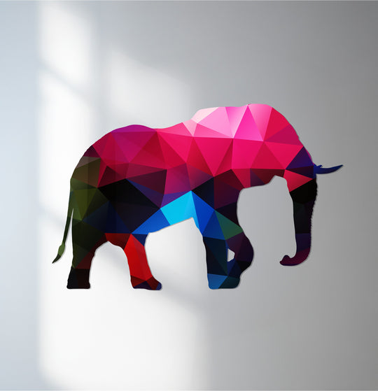 Sunlit gradient gray wall provides a sleek backdrop for the colorful elephant metal wall decor, enhancing its modern geometric animal aesthetic.
