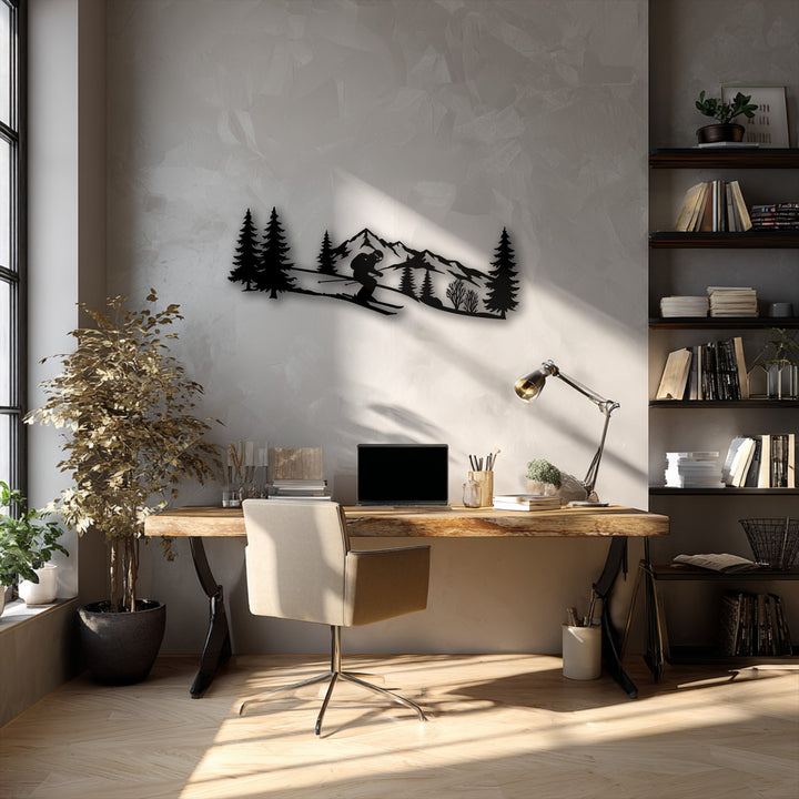 A textured light gray wall features a striking black metal wall decor depicting a skier on an alpine adventure mountain.