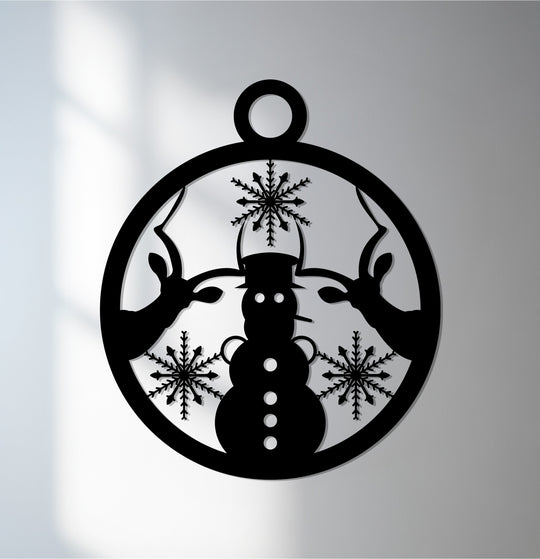 Detailed snowflakes enhance the decorative metal art of this Winter Embrace wall hanging, featuring a snowman and reindeer design perfect for Christmas decor.
