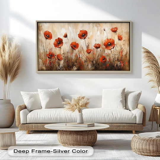 Displayed above a woven sofa is an earthy-toned flower oil painting reproduction print featuring vividly red poppies as the central subject.
