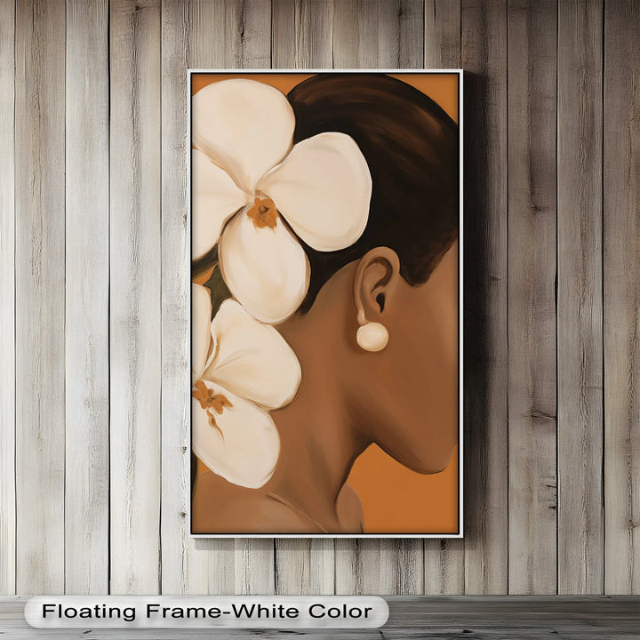 The subtle interplay of light and shadow on the woman's skin and the soft petals of the flowers creates a serene and harmonious composition.

