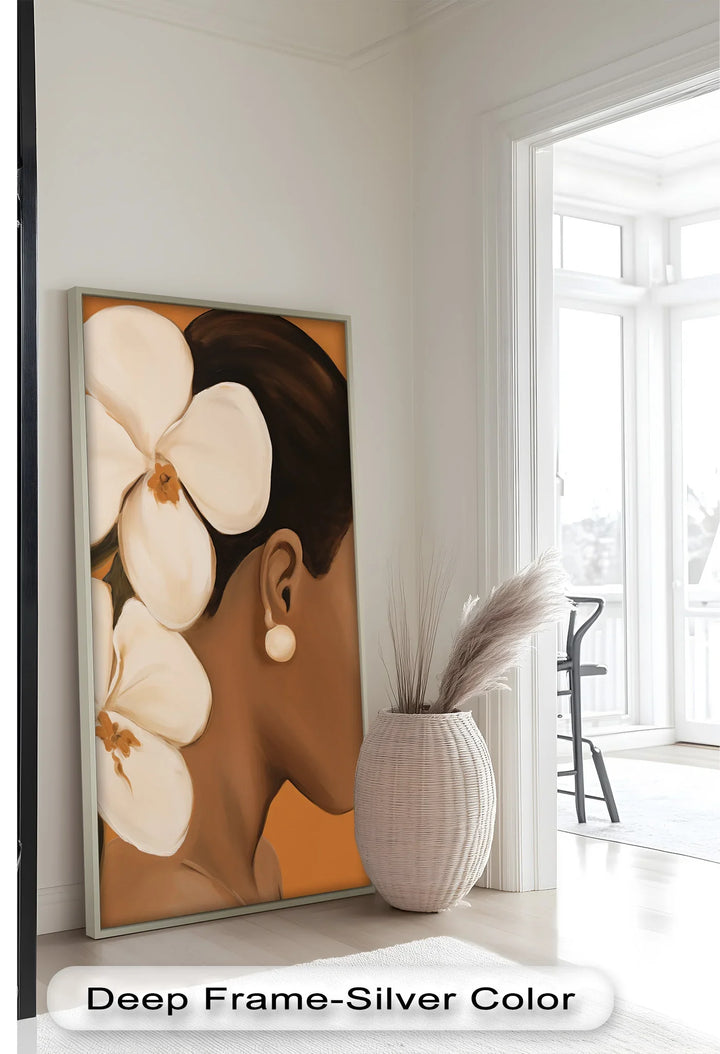 This elegant portrait captures the profile of a woman adorned with two beautiful white flowers in her hair, exuding grace and timeless beauty.

