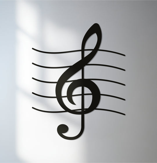 A black treble clef stands proudly, showcasing music through unique metal wall art, elegantly displayed with its staff lines in sleek musical note wall decor.
