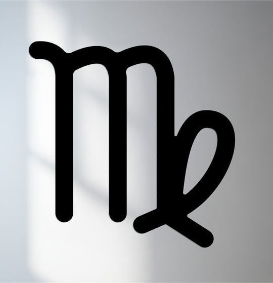 Negative space outlines the Virgo zodiac symbol in this astrology metal artwork, creating a striking contrast in this unique metal artwork.
