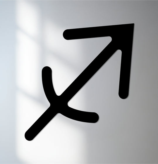 Bold sagittarius zodiac symbol, presented as striking metal wall decor, forms the loudest element in this astrology-inspired metal wall art.