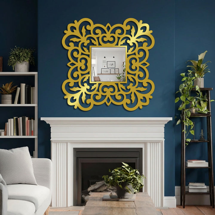 Gold-toned finish highlights the ornate floral scrollwork of this square decorative mirror, lending a luxurious touch to its metal frame detail.