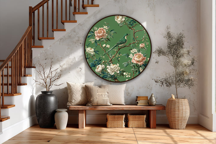Negative space surrounds the round oil painting reproduction print of an emerald songbird nestled among blossoming flowers, creating a visually soothing contrast.