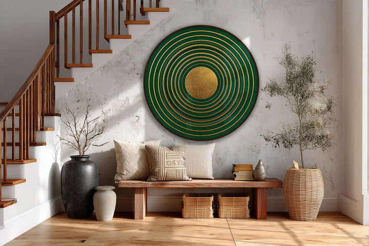 Displayed as the focal point, a round emerald and gold Emerald Orbit Rings oil painting art piece showcases concentric rings, enhancing the room's decor.