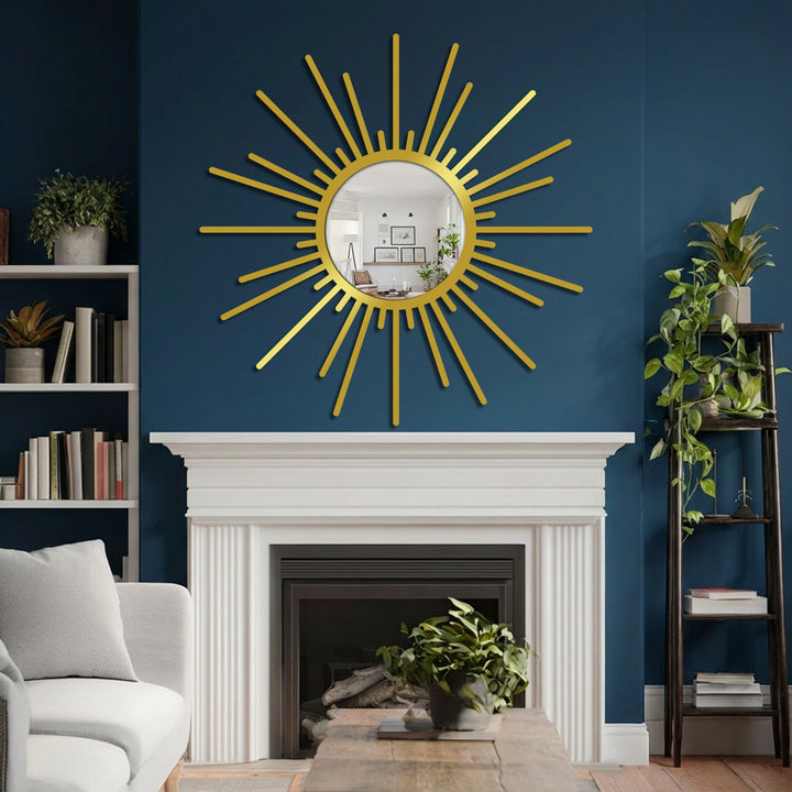 Contrasting navy wall paint with a white mantel enhances the golden sunburst frame in this modern wall mirrors design, reflecting light.
