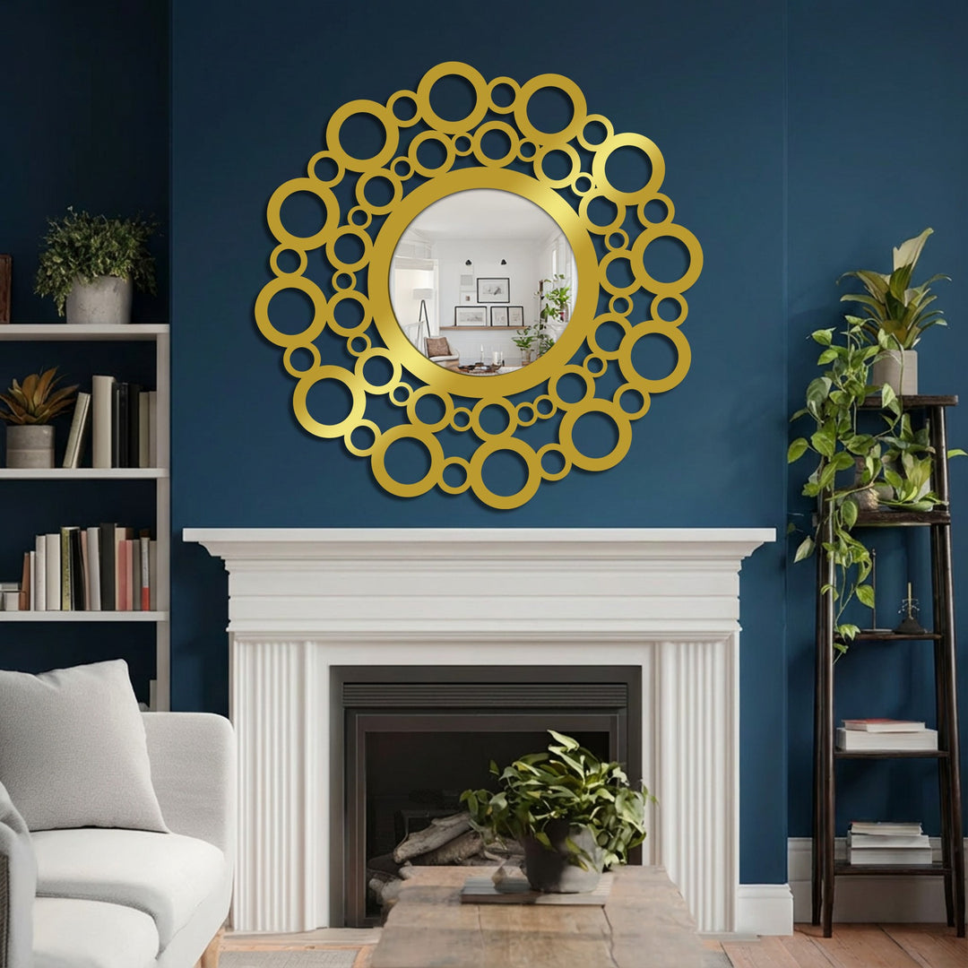 Shadows accentuate the modern artistic design of the bubble circle frame metal wall mirror, highlighting the unique metal wall art against the dark blue wall.