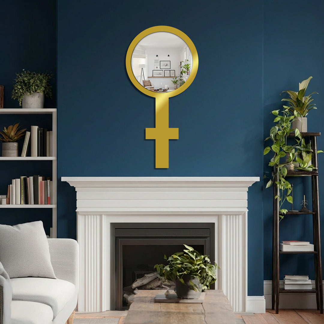 Visual rhythm is created by the Venus symbol mirror for wall decor, which breaks up the navy wall with its round shape above the linear fireplace and molding.