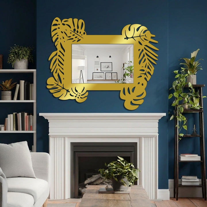 Inviting and luxurious, this modern wall mirrors exudes tropical sophistication with its gold-toned tropical leaf frame, bringing a botanical statement to a stylish interior.