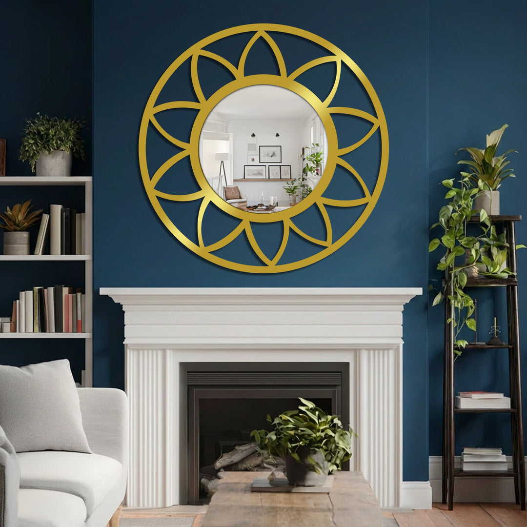 Deepest shadows highlight the decorative mirror reflecting a room with a white fireplace and contrasting with the gold petal-shaped frame, a striking piece of decorative metal art.