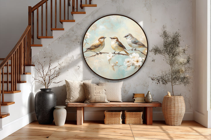 Subtle light and shadow interplay enhances the Whispering Blossoms round oil painting, a charming oil painting decoration showcasing three songbirds amidst delicate blossoms.