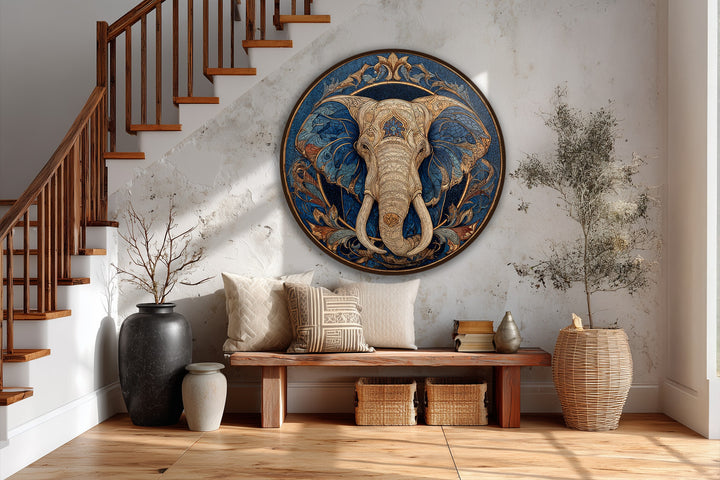 Cracked white walls with light shadows create a textured background for the majestic guardian ornamental elephant round oil painting wall art.