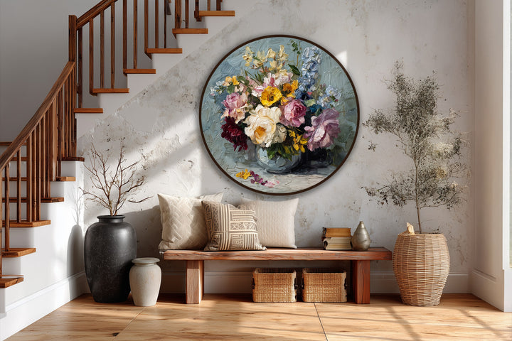 Behind the radiant bouquet, the textured wall contributes to the oil painting decoration with its interplay of light and shadow near the staircase.