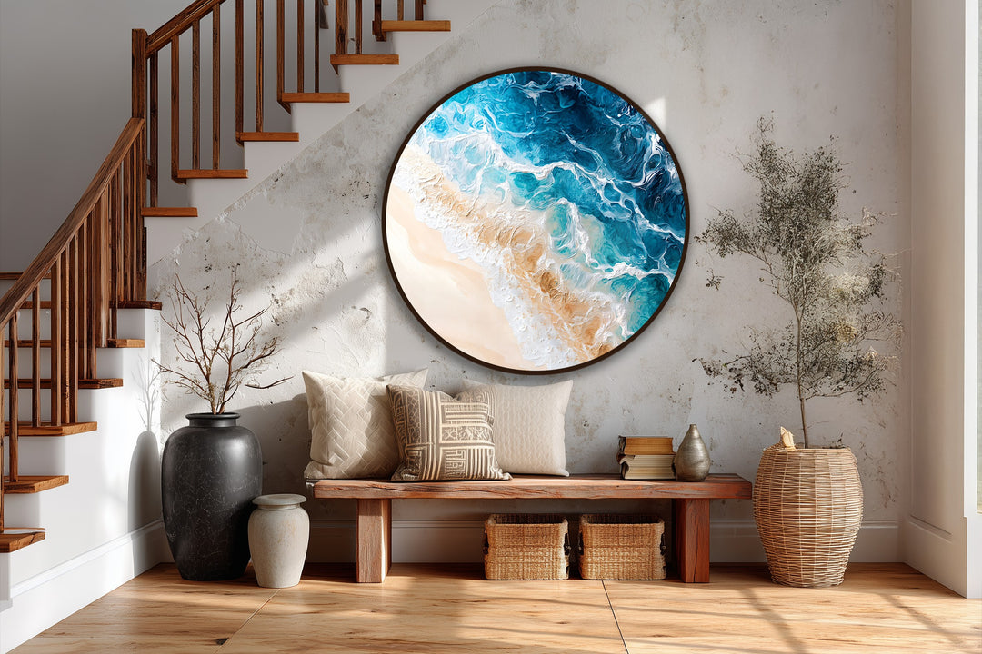 The stillness of the scene is captured by the Coastal Serenity round oil painting decoration, featuring a mesmerizing turquoise ocean wave lapping against the silent shore.