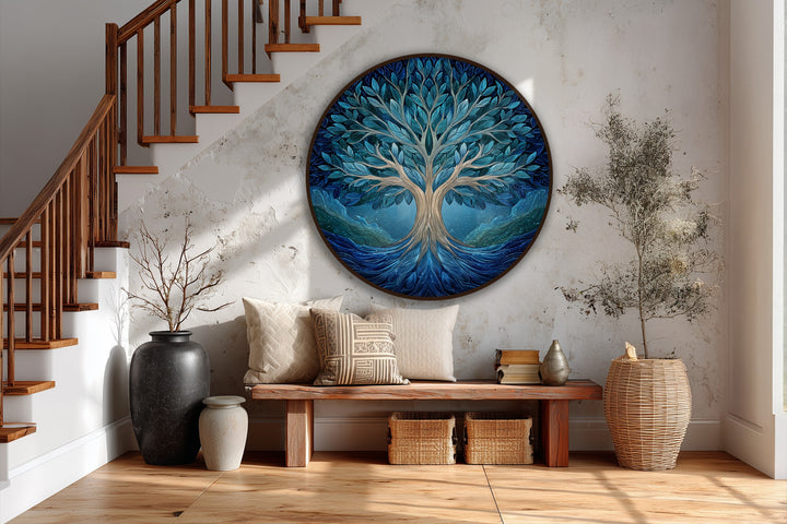 The loudest element of this elegant Midnight Harmony, a blue Tree of Life round oil painting artwork, features a calming tree with flowing roots.