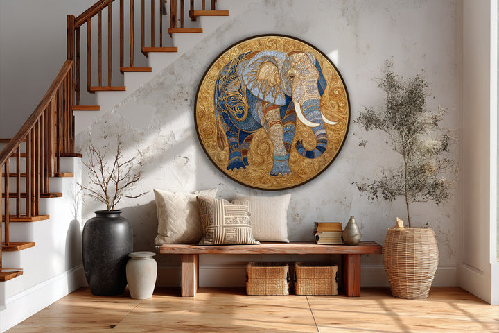 Foreground arrangement featuring a wooden bench with textured pillows complemented by neutral vases alongside the majestic golden elephant medallion round oil painting home decor.