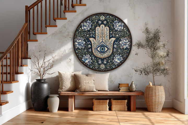 Foreground details showcase a symbolic round oil painting wall art of a floral Hamsa hand with an eye motif, bringing a spiritual and calm ambiance.