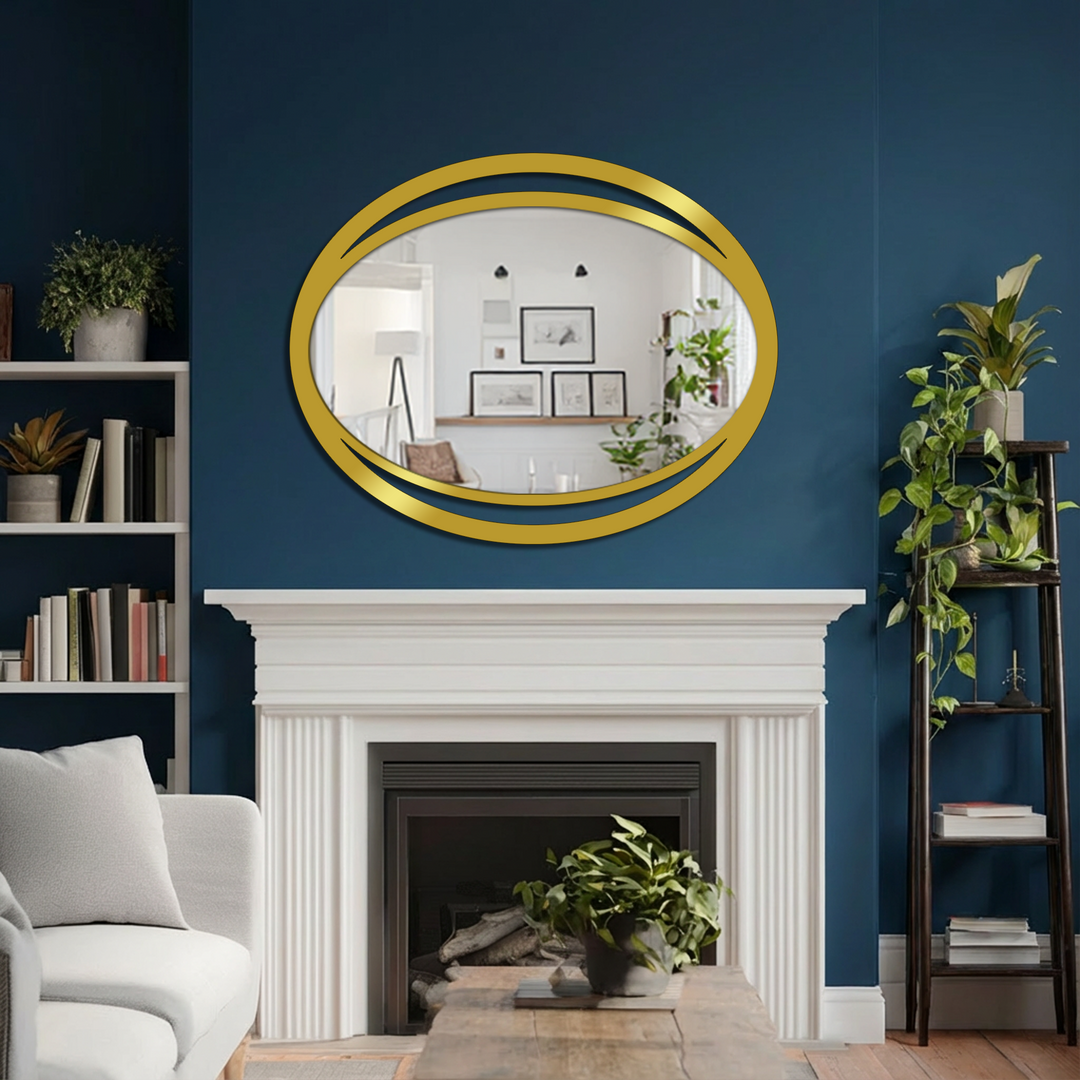 Gleaming gold modern mirror dominates above a fireplace, its double eclipse oval frame a striking and sleek visual focal point.