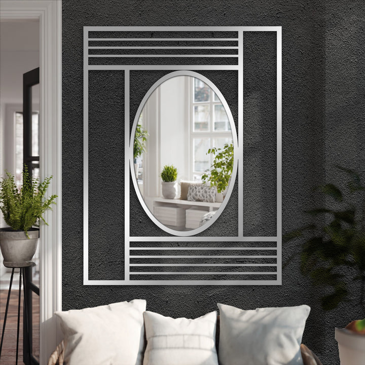 Contrasting light and shadow play across the structured lines of this geometric oval floor mirror, enhancing its decorative modern frame while decorating with wall mirrors.