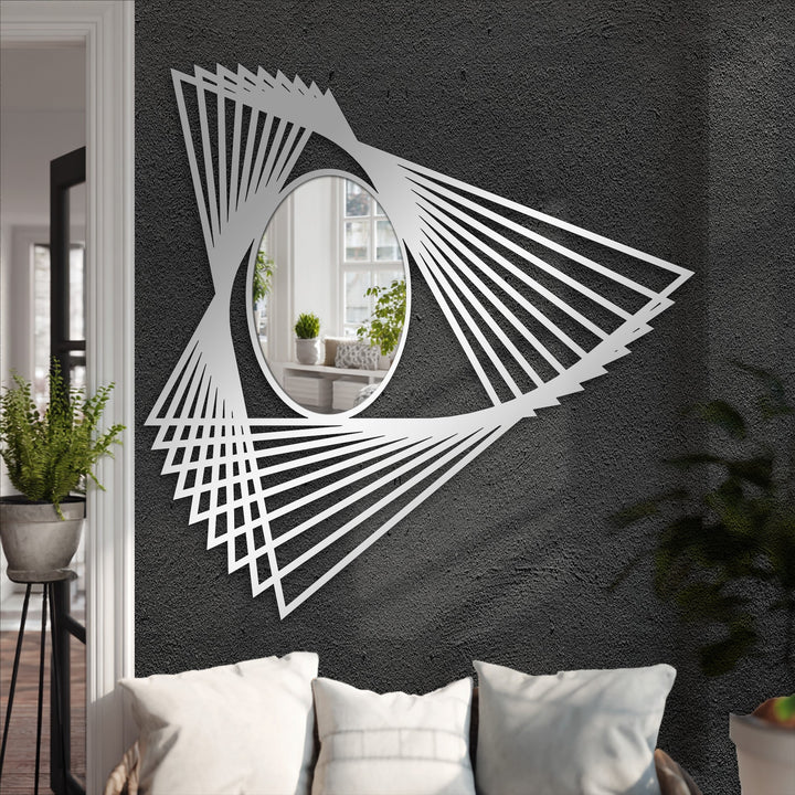 The angular motion lines of this geometric floor mirror's metal artwork create a dynamic sense of movement, decorating with wall mirrors adding energy to the room.