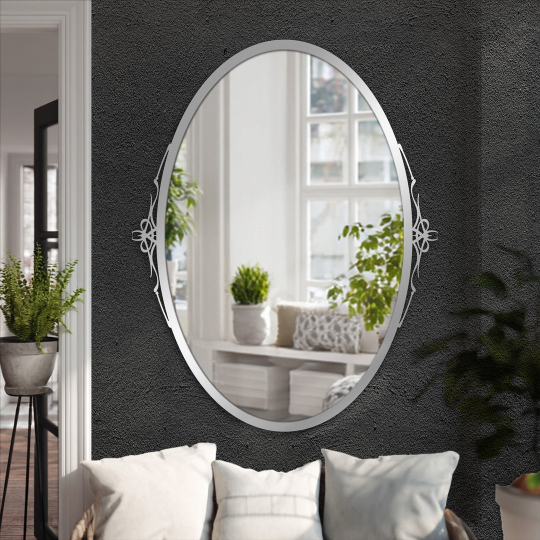 Realistic details showcase the Elegant Simplicity Oval Floor Mirror, a stunning bathroom mirror, with its delicate side accents reflected in the glass.
