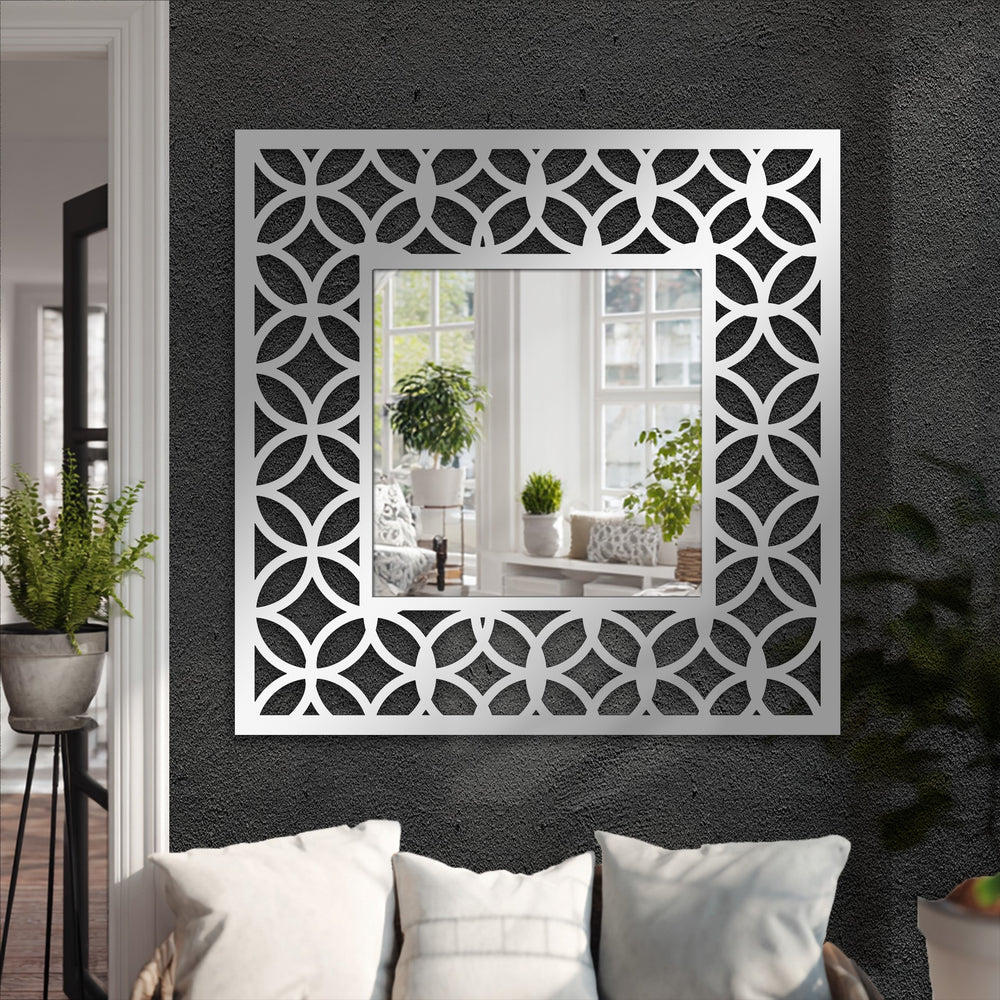 Moderately saturated, the interlocking circle pattern square floor mirror for wall decor features a geometric frame and reflective surface.