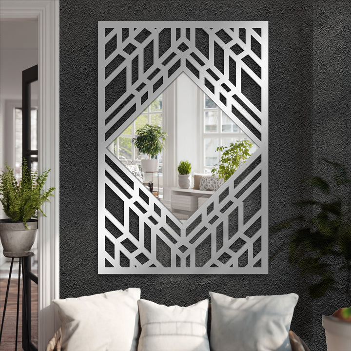 Transitioning from the dark wall, this modern wall mirrors design features an art deco geometric diamond mirror with a unique metal frame and layered line accents.