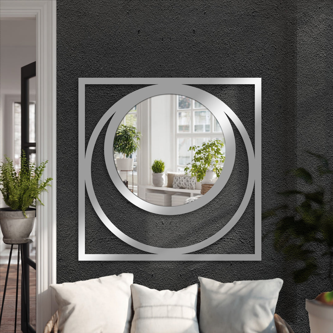 The stillness of the eclipse square floor decorative mirror is reflected in the mirrored surface, offering a geometric, modern black metal moment.