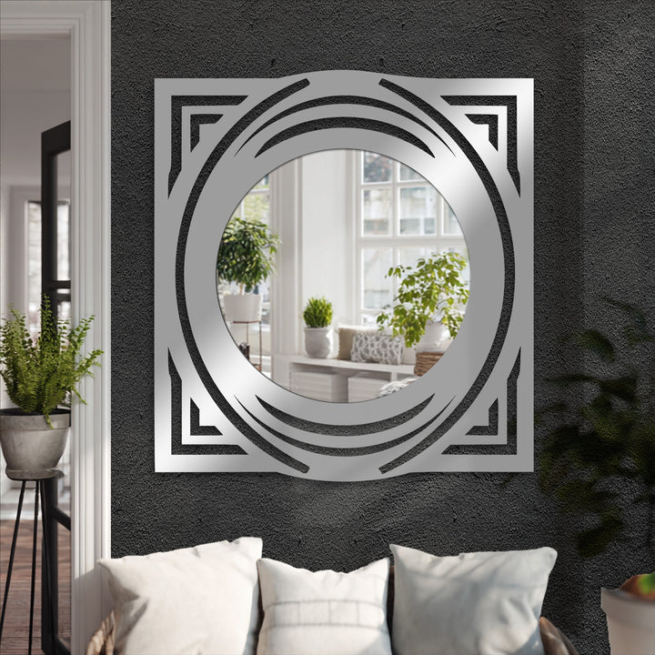 Realistic detailing showcases the orbit crest floor mirror, a square black metal geometric frame reflecting a modern mirror design in a well-lit space.