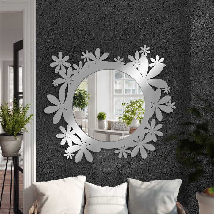 Depth of the reflected room enhances this framed wall mirror, its floral design adding layers and visual interest to the decoration wall art.