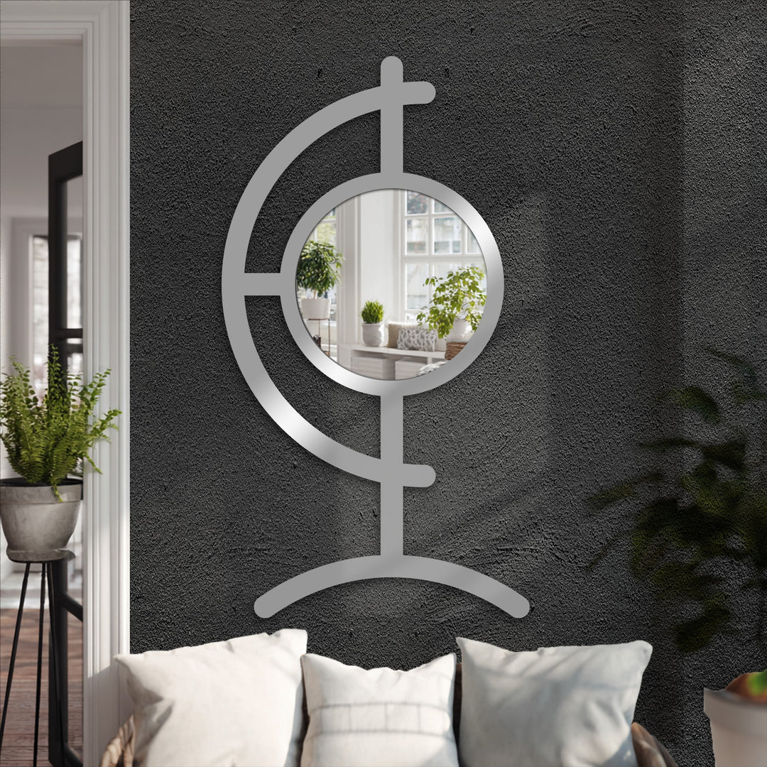 The tranquil mood emanates from this Orbit Line Floor Mirror, a modern sculpture that enhances decorating with wall mirrors in a stylish, black metal artwork.