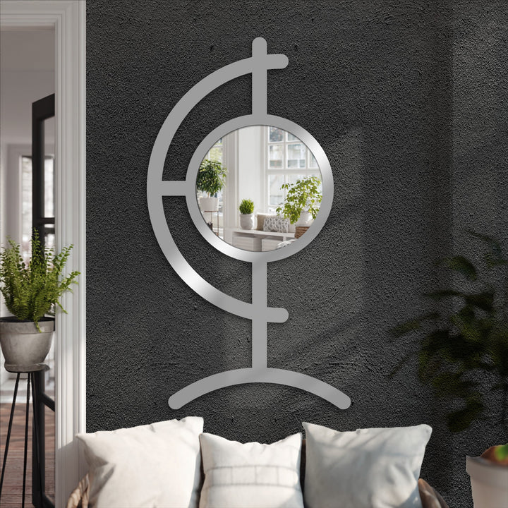 The tranquil mood emanates from this Orbit Line Floor Mirror, a modern sculpture that enhances decorating with wall mirrors in a stylish, black metal artwork.