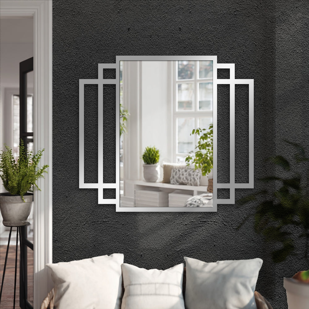 Highlighting the abstract quality of the Layered Side Frame Metal Wall Art Mirror, its geometric design reflects modern decorating with wall mirrors to create a unique visual statement.