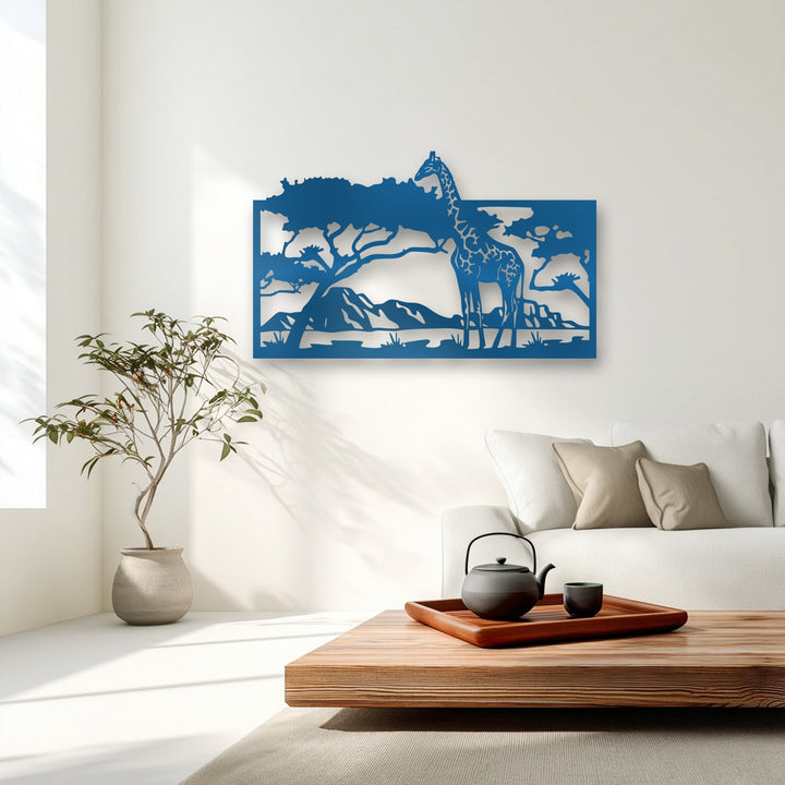 The deep blue decorative metal art depicts a layered savannah giraffe scene silhouette, creating a profound sense of depth against the bright wall.