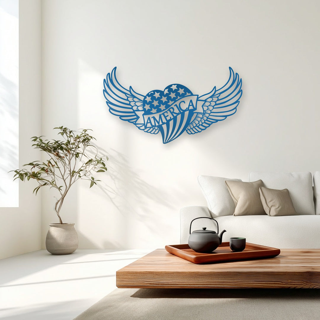 A vibrant blue winged heart design featuring stars and the word 'AMERICA' as a stunning piece of decorative metal art.
