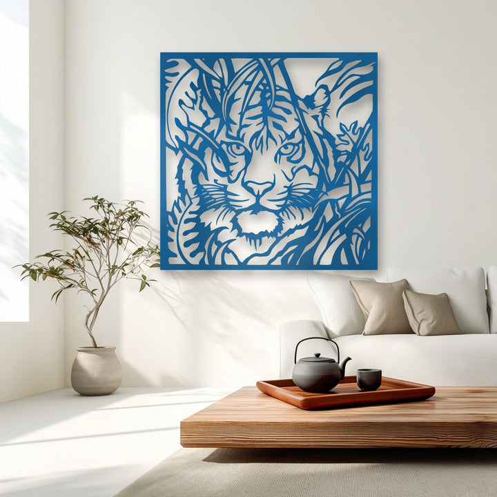 The realistic detail of the unique metal wall art captures a majestic tiger's gaze through intricate jungle foliage, a captivating piece.