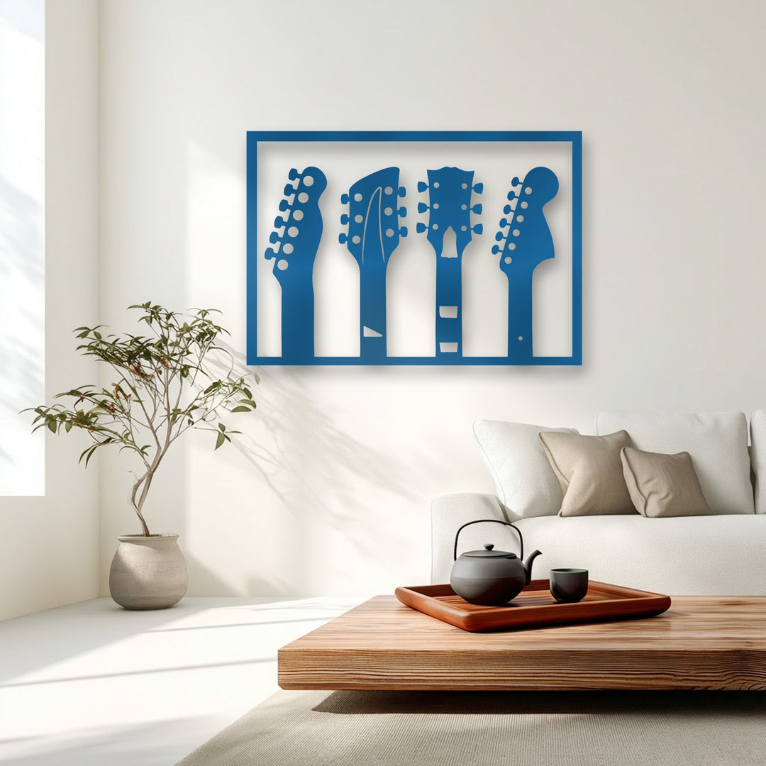 Geometric elements reveal four distinct guitar headstock silhouettes in an azure hue, neatly framed as unique metal wall art.